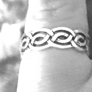 A silver pinky ring or it could go on your toe